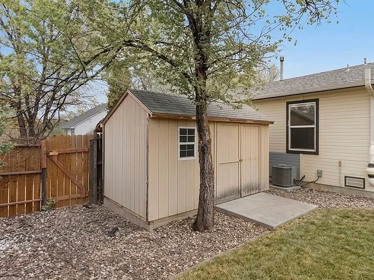 Storage shed. Wired with lighting and outlets.