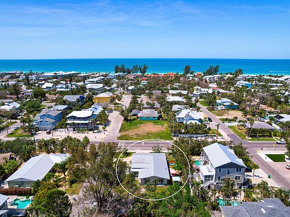 Just 3 breezy blocks from the sugar-white sands and sparkling waters of Anna Maria Island