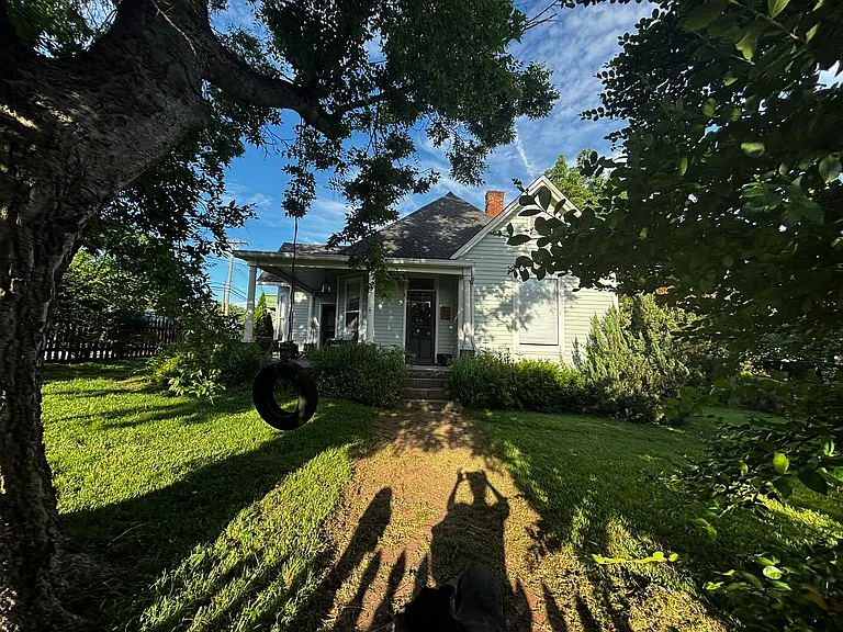 The Caldwell House, circa 1902. Historic charm meets modern style. 3 porches/decks, 2 gas fireplaces and 1 woodburning fireplace. Off street parking.