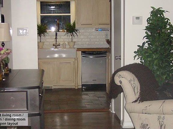 Open living/kitchen/dining areas