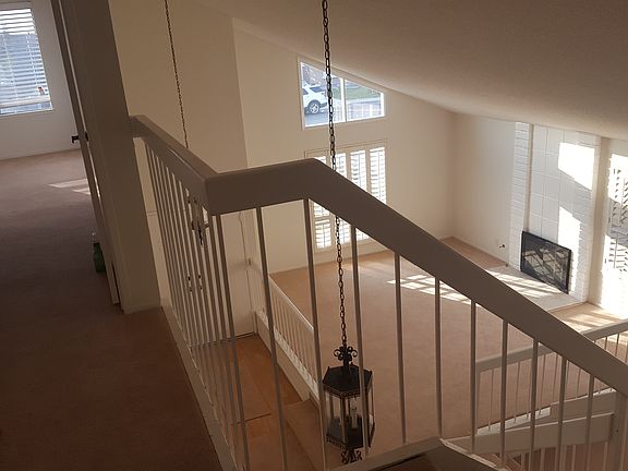 From Upstairs Hallway into Living Room