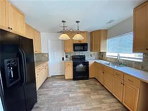 1409 Madrid Way - A — Photo 3