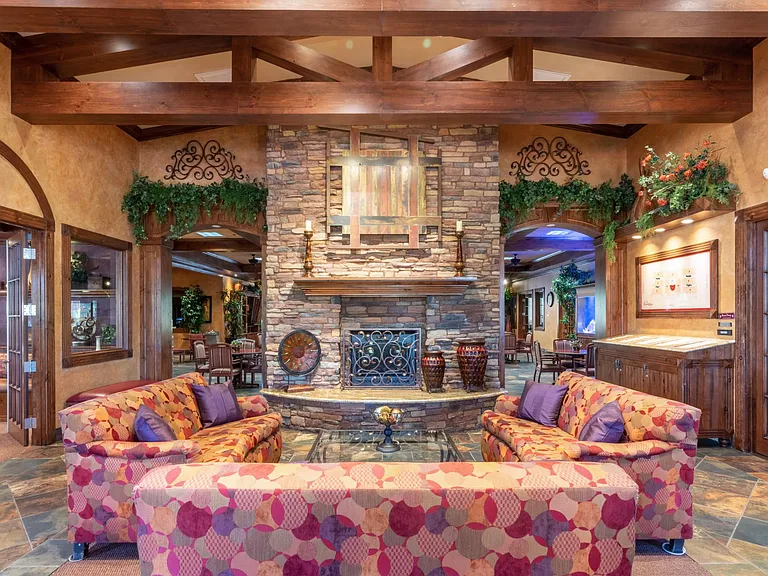 Centered around an elegant 6,000 sq. ft. Clubhouse, Carefree Senior Living Apartments offer many amenities including an onsite salon, billiards and game room, a fully equipped fitness center, business center and library, player grand piano, onsite ATM, st