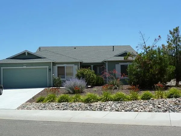 7702 N Dusty Trail Way — Photo 1