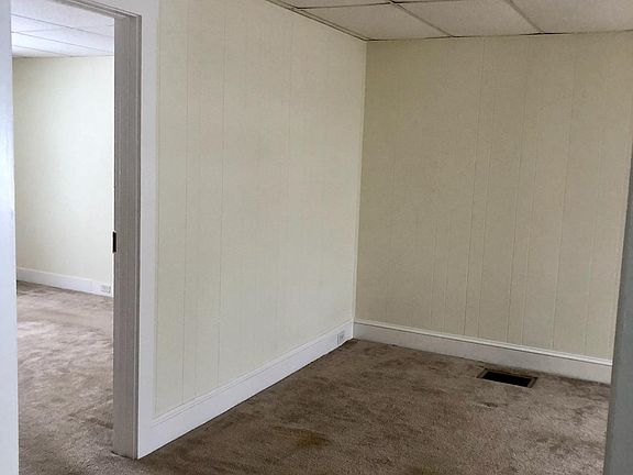 Living Room with master bedroom entrance