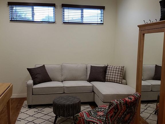 Fully furnished: sectional with storage under cushion, table, side chair et cetera