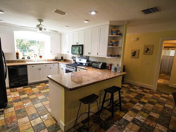 New Kitchen with High End Granite Counters, Designer Tile & Upgraded Appliances