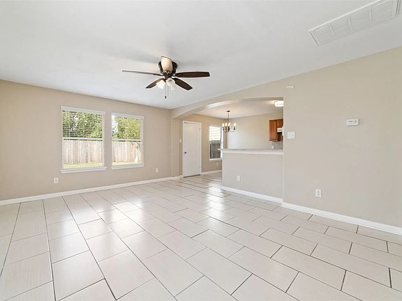 Living Room: Please note tile has been replaced with luxury vinyl.