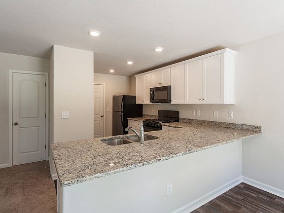 Granite countertops and recessed lighting