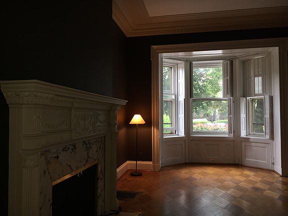 View fireplace and window