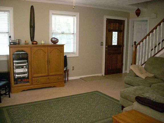 Living room with new carpet and paint.