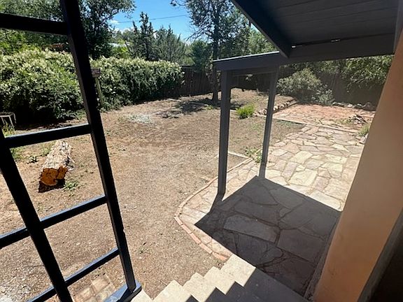 View of back yard from back door of main house