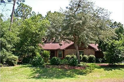 Wooded backyard offers lots of privacy! Interior photos will follow.