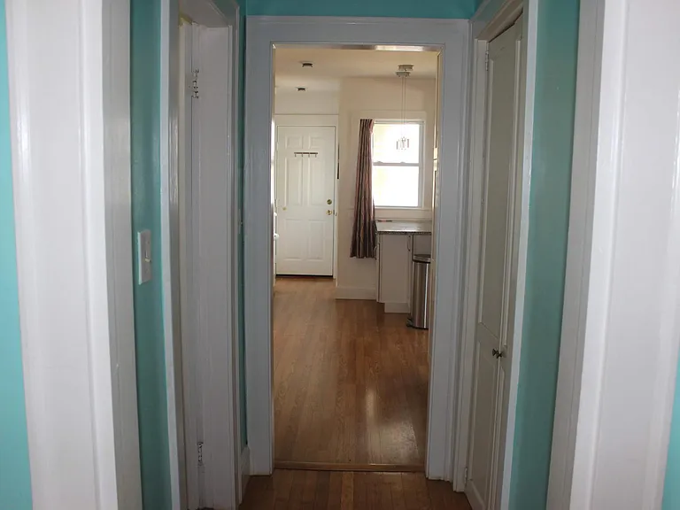 Foyer(between kitchen and Living room)Foyer has 1/2 bathroom(on left wall in pic) and access to Basement (on right wall in pic)