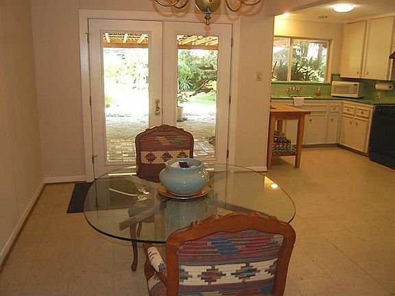 Dining Room to Kitchen View.   French Doors overlook PARADISE.