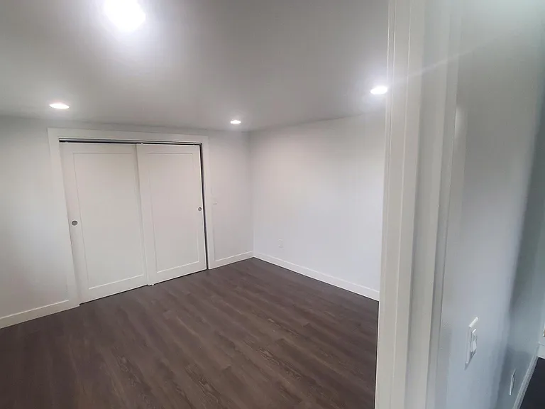Master bedroom is well light, with a large closet