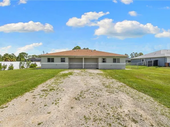 909/911 Jaguar BLVD, LEHIGH ACRES, FL 33974