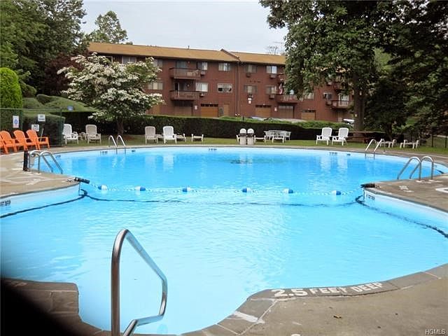 Large pool with patio.