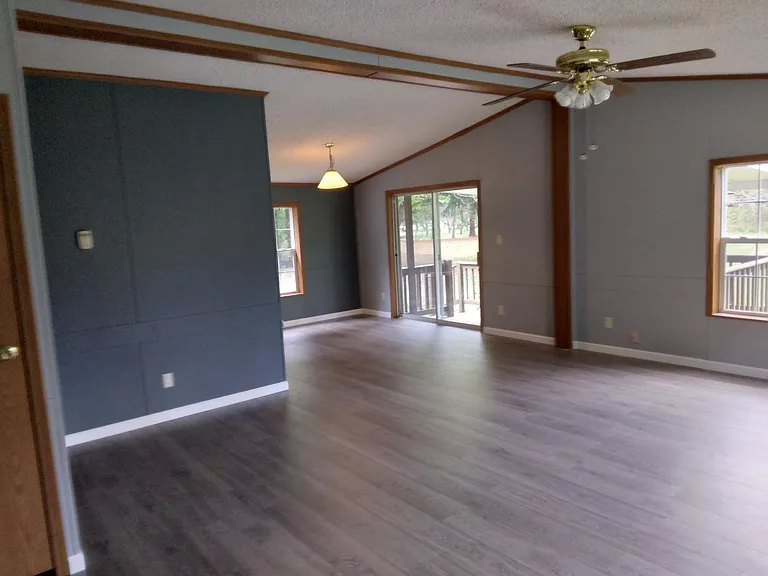 View from front door, family room & dining room.