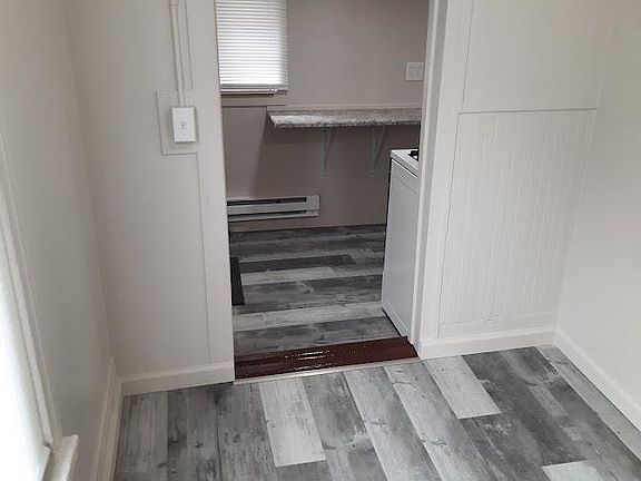 Dining area looking into kitchen