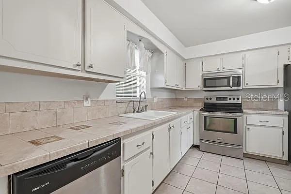 1706 Belleair Forest Dr #136 — Photo 9