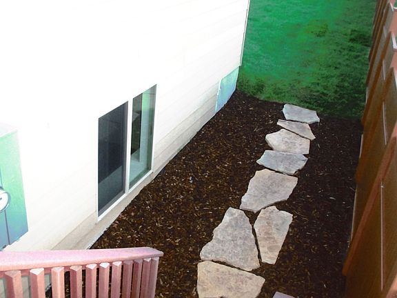 Flagstone walkway from deck 