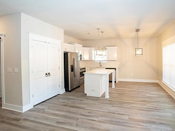 Plenty of Room for a Kitchen Table or Eat At Island with the Addition of Bar Stools
