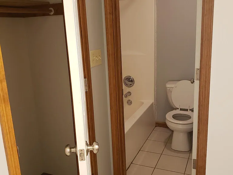Walk-in clothes closet and separate water closet located in master bedroom in ensuite
