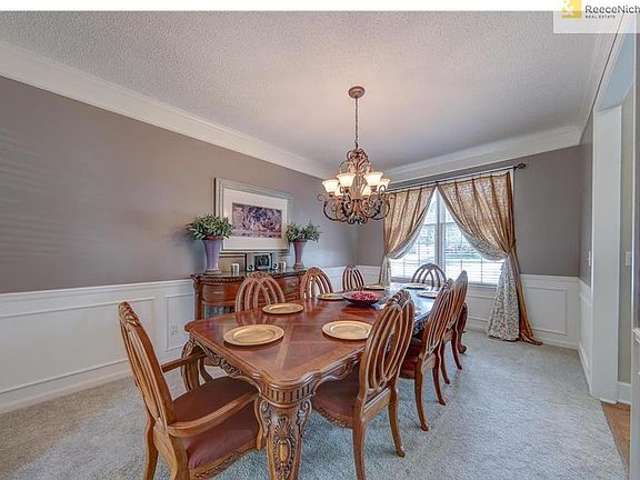 New paint / Carpet enhance the beauty and size of this Dining Room.