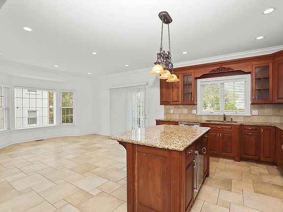 Spacious Eat-in Kitchen/Dining Area w/Sliders to Private Patio/Yard