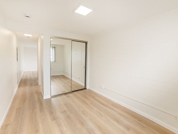 mirrored closet door in bonus office