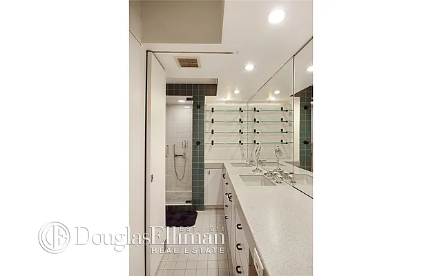 Sold by Douglas Elliman | media 13