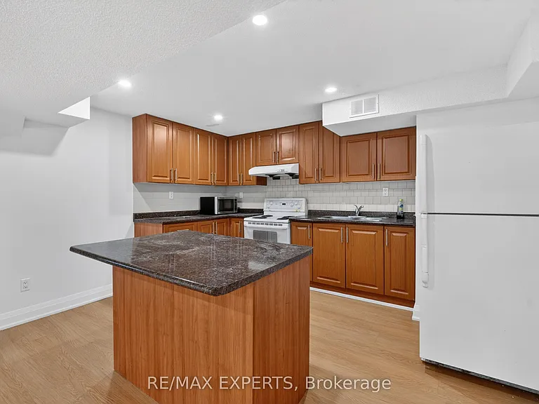 5058 Oscar Peterson Blvd — Photo 4