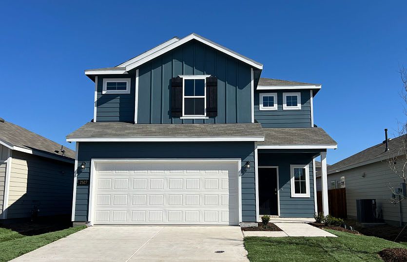 The Piney, a one-story home with 2-car garage exterior features and options may vary