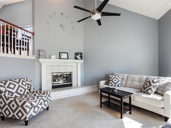 Light and Bright Great Room on the font of the home has a vaulted ceiling and gas fireplace.