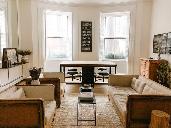 Dining & work station overlooking tree-lined Hancock Street.