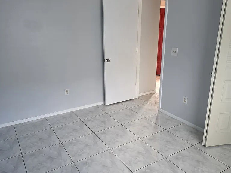 bedroom 1 from other corner showing door to enter