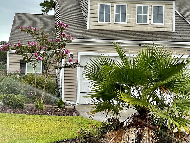 This is a paired ranch style townhome. It is attached to one neighbor on one side only. The main entrance is on the left side.