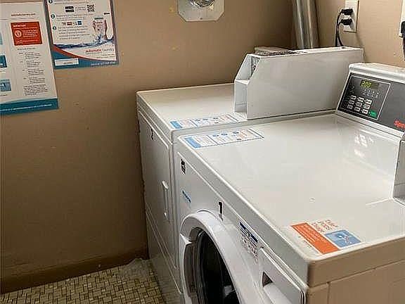Washer and dryer in building.