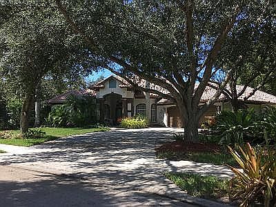  Front of Home, Mature Oaks