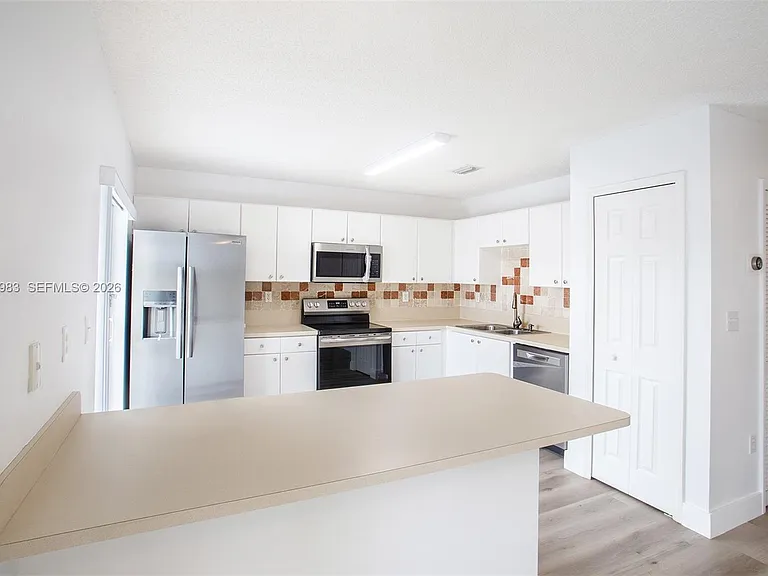 8949 SW 214th St — Photo 10