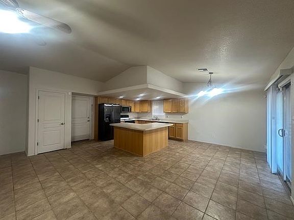 4th image of 11144 E 26th Pl