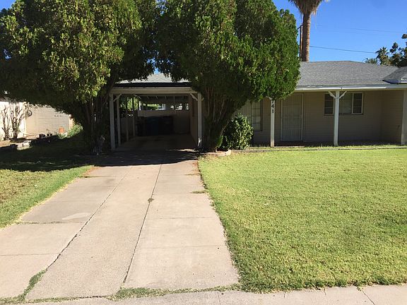 Carport with room for anothe
