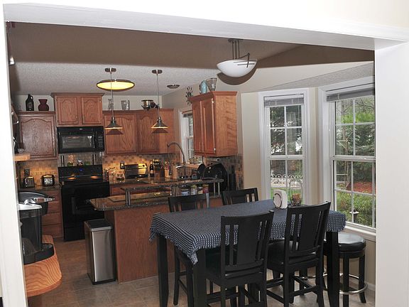 Living room to kitchen/bay