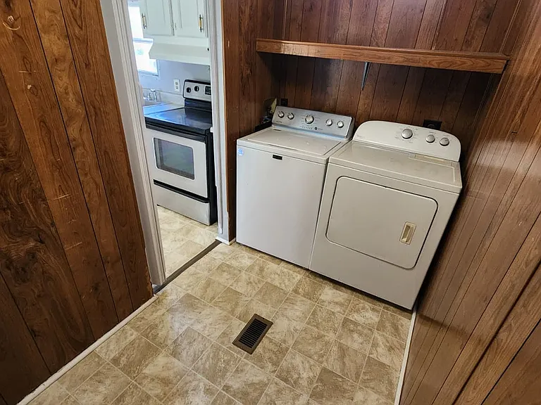 Laundry room with washing machine and dryer.
