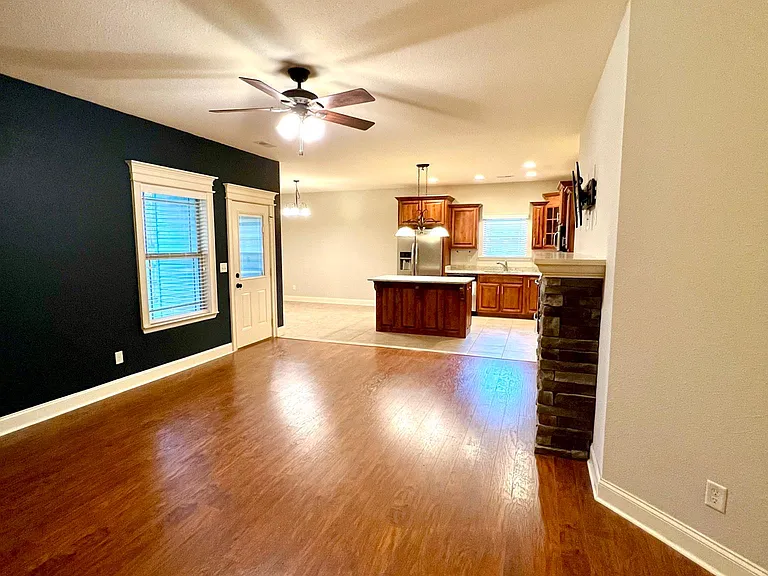 Open concept living room and kitchen.