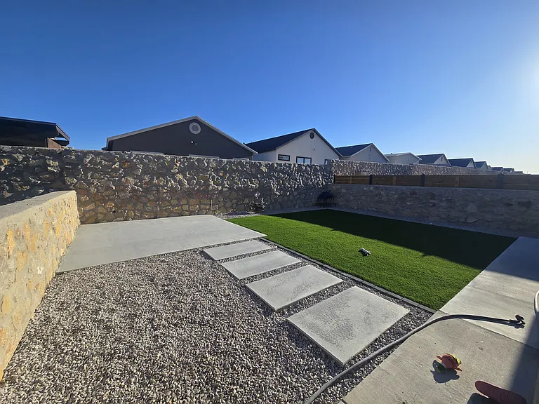 Beautiful backyard with artificial turf and patio_perfect for BBQs, hosting friends, or relaxing.