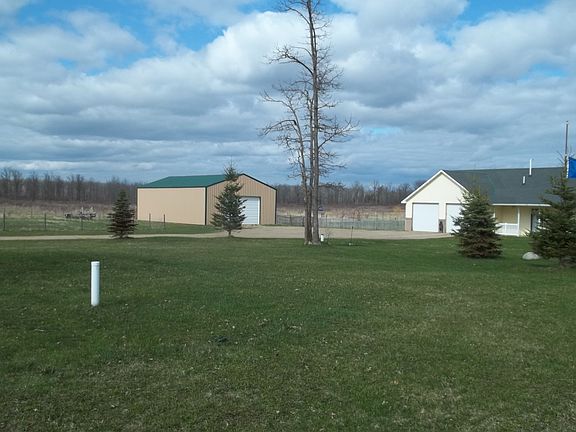 Side yard w/Pole Barn