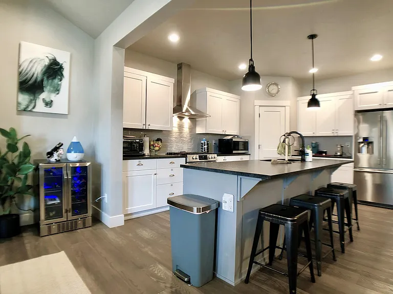 Kitchen - NEW condition barely used. 
* Fully equipped just like a home
* Dishwasher
* Refrigerator *
* Large toaster
* Microwave 
* Air fryer 
* Oven
* All dishes, utensils, cooking utensils & spices 
* Blender
* Pressure cooker
and more