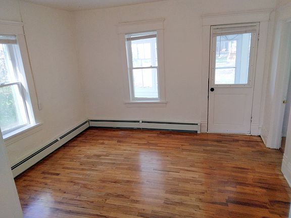 Living room, looking towards front door.